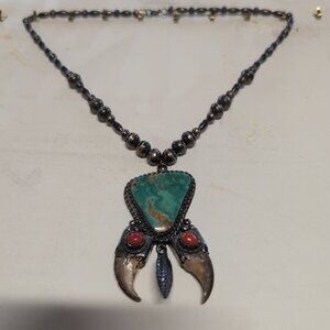 Native American made Sterling Necklace - Turquoise, Coral, Claw. Marked "H"